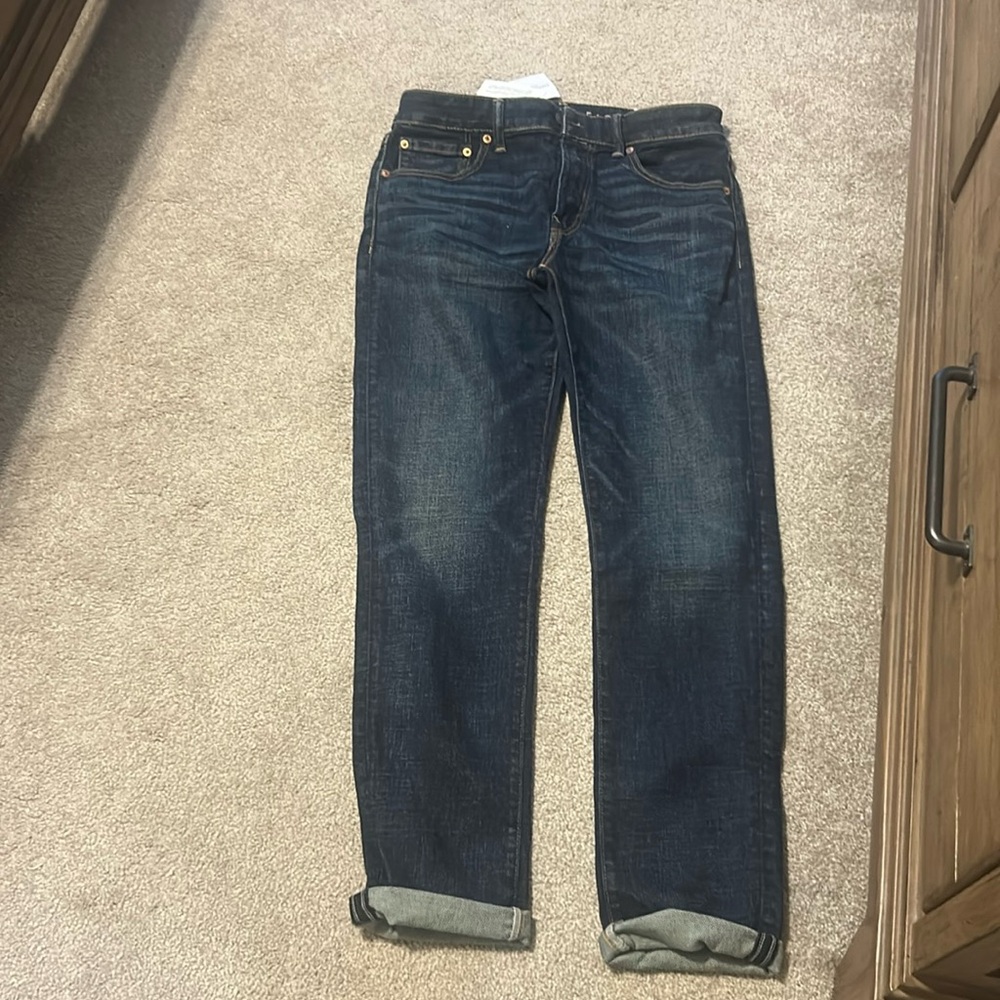 American Eagle new with tags.  Airflex 31 x 32 slim fit jeans dark wash